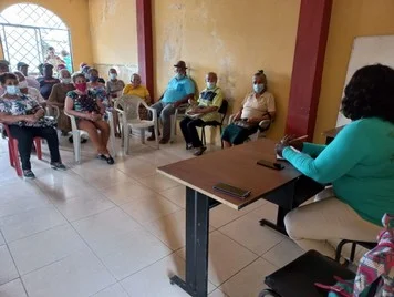 Reunión para la construcción y ejecución del Proyecto Gerontológico del Día, Recinto la T